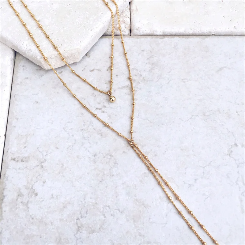 Collier en perle de document