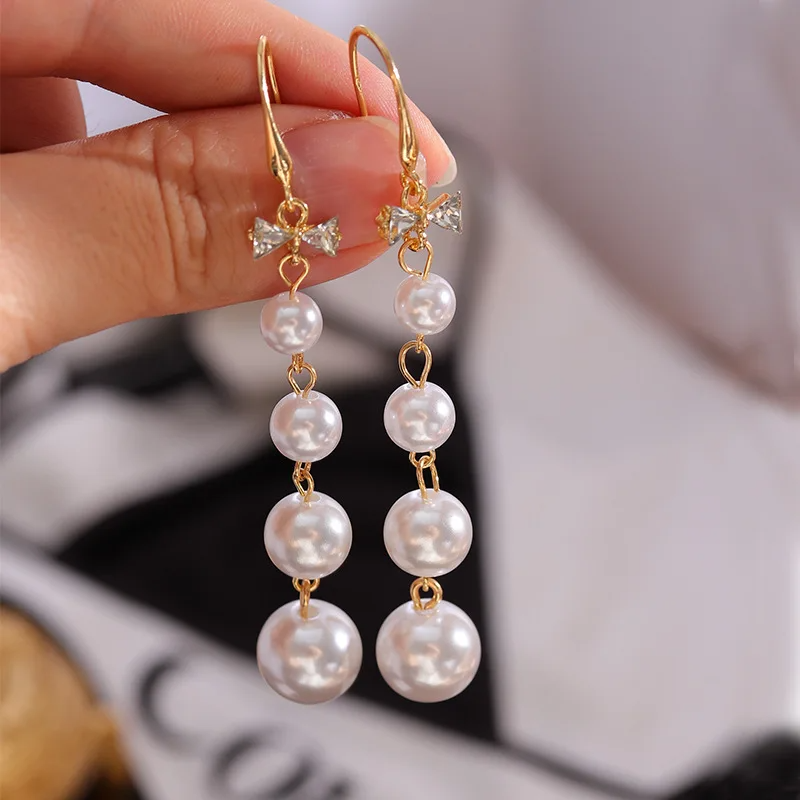 Boucles d'oreilles imitation perle long