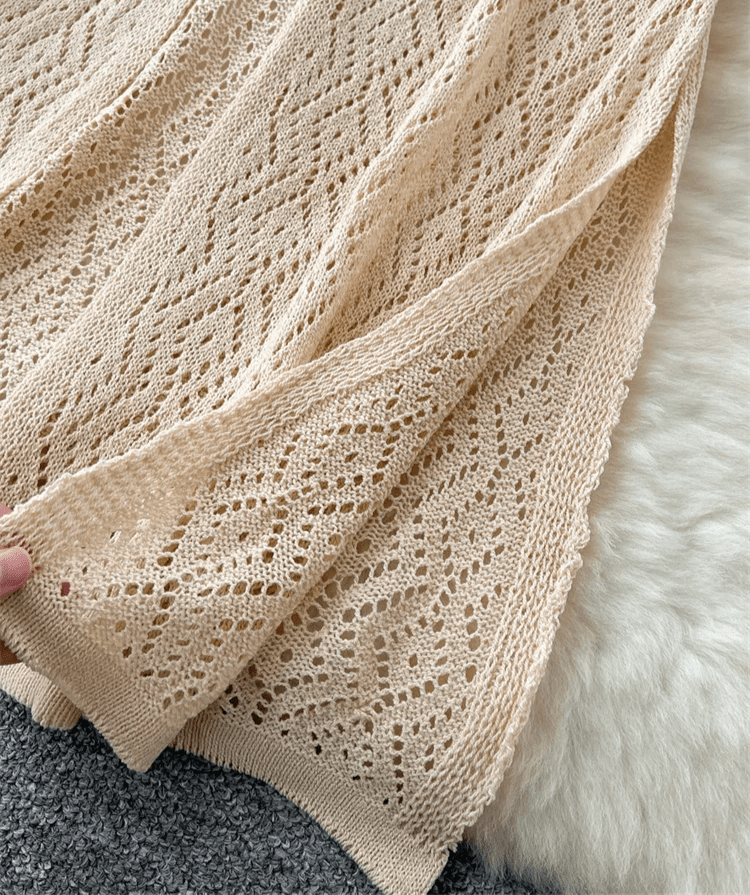 Cardigan mi-long col V