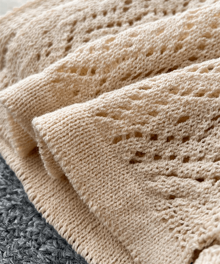 Cardigan mi-long col V