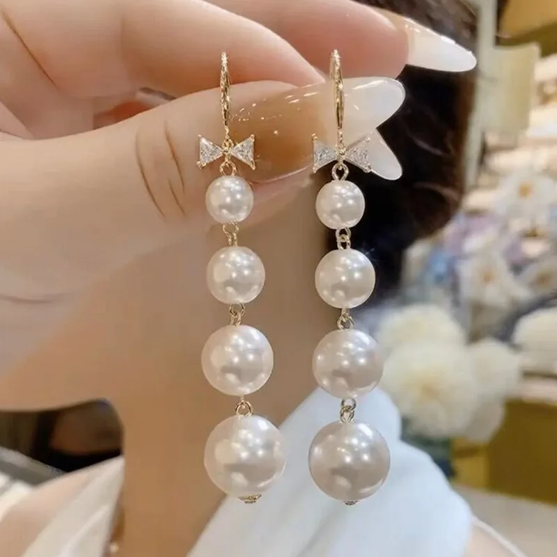 Boucles d'oreilles imitation perle long