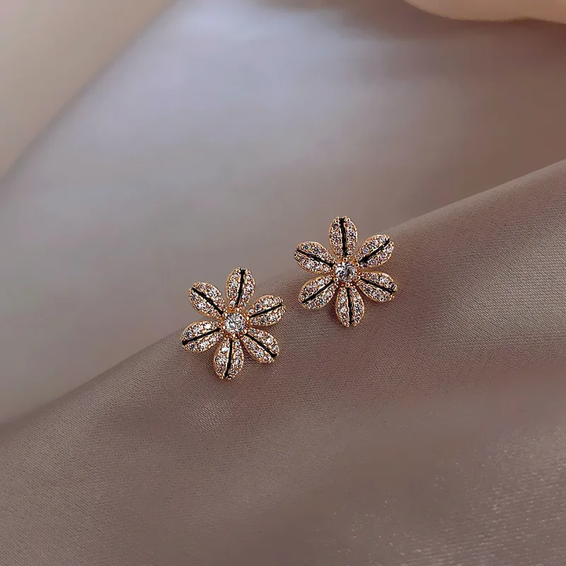 Boucles fleur de lys